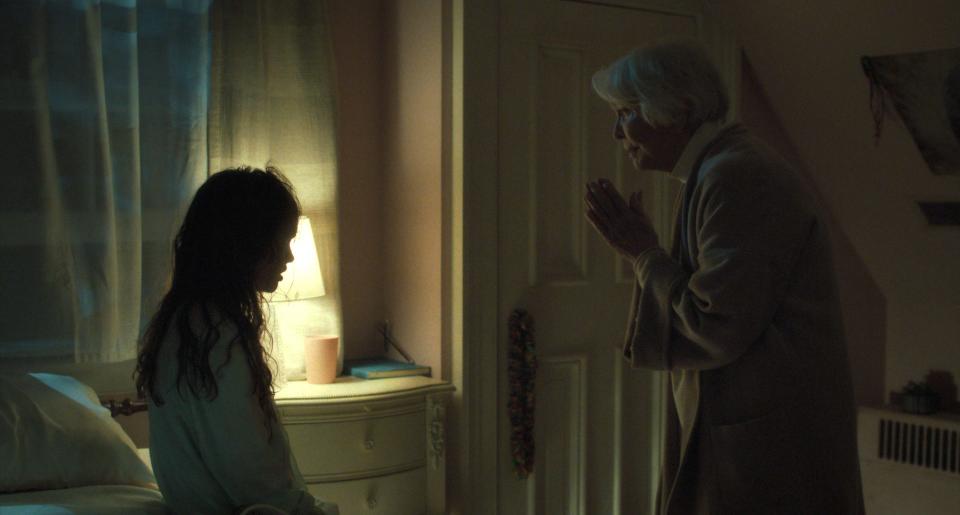 Look out for that crucifix: Chris MacNeil (Ellen Burstyn, right) confronts the possessed Katherine (Olivia O’Neill) in "The Exorcist: Believer."