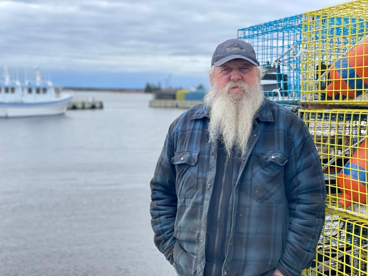 Weldon Harding, a veteran fisherman at MacEachern's Point wharf in Tabusintac, says the channel to enter the harbour is narrow and needs to be dredged.   (Alexandre Silberman/CBC - image credit)