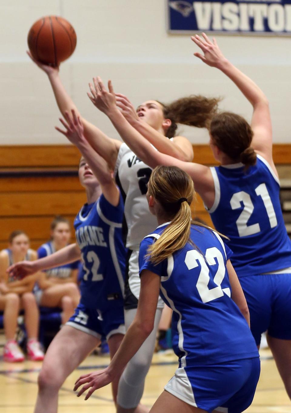 Putnam Valley's Eva DeChent (21) goes up for a shot against Haldane on her way to scoring her 2,000th point in a game at Putnam Valley High School Feb. 7, 2023.