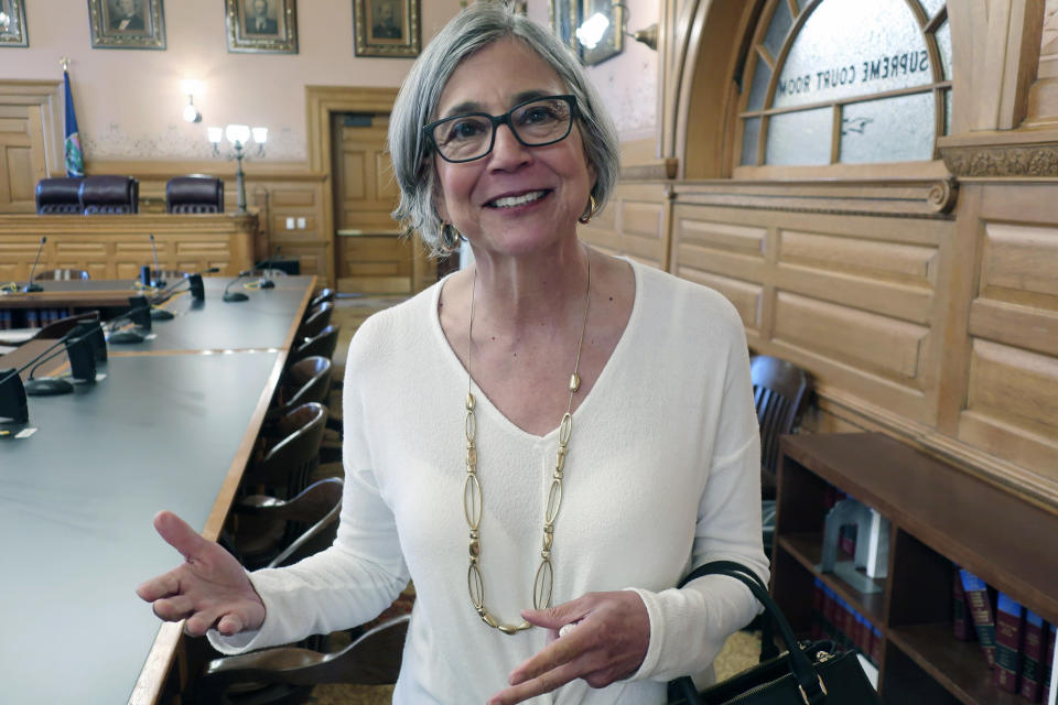 Kansas Senate President Susan Wagle, R-Wichita, answers questions from reporters following a meeting of legislative leaders with Democratic Gov. Laura Kelly about the coronavirus pandemic, Thursday, July 2, 2020, at the Statehouse in Topeka, Kan. Wagle opposes an order Kelly issued to require people to wear masks in public, saying the governor should have launched a public information campaign instead. (AP Photo/John Hanna)