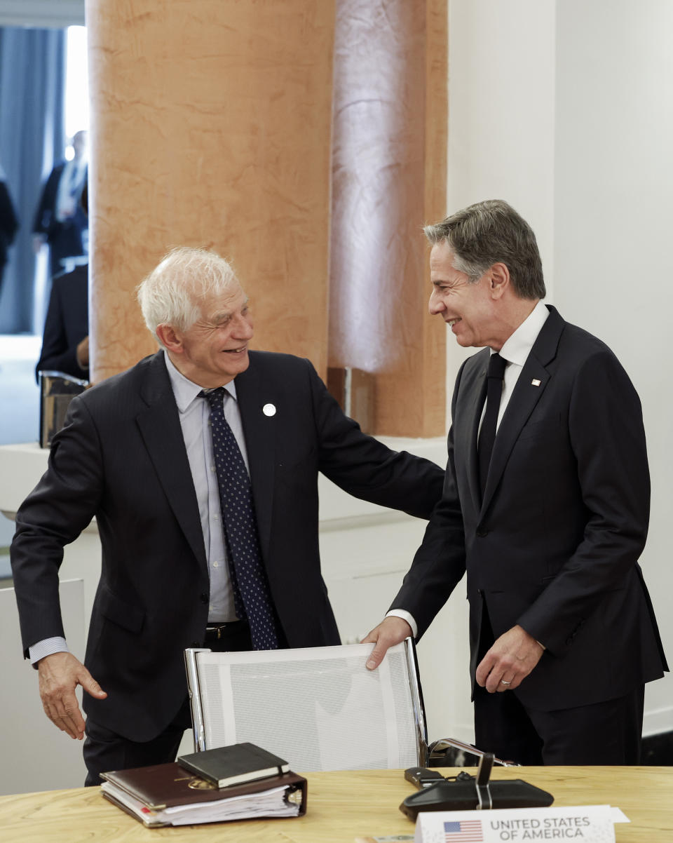 European Union foreign policy chief Josep Borrell, left, and U.S. Secretary of State Antony Blinken attend a meeting on the second day of a G7 foreign ministers meeting on Capri island, Italy, Thursday April 18, 2024. (Remo Casilli/Pool via AP)