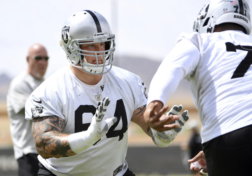 Las Vegas Raiders guard Richie Incognito (64) performs a drill during an NFL football organized team activity at the team's training facility Wednesday, May 26, 2021, in Henderson, Nev. (AP Photo/David Becker)