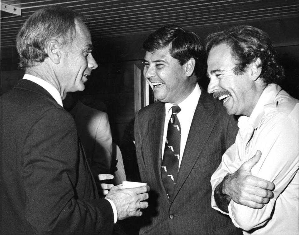 For Miami Story running in Neighbors David Pearson (left) Sentor Bob Graham (center) Jimmy Buffett (right) at Save The Manatee event