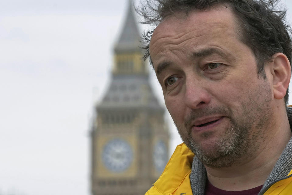 Graham Smith of the campaigning group republic speaks during an interview in London, Thursday, April 27, 2023. There will be dissenters among the cheering crowds when King Charles III travels by gilded coach to his coronation. More than 1,500 protesters will be dressed in yellow for maximum visibility and they plan to gather beside it to chant “Not my king” as the royal procession goes by on Saturday. (AP Photo/Kin Cheung)