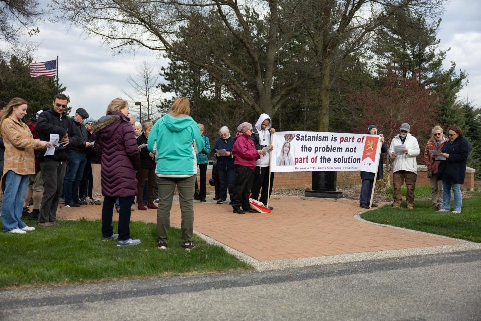 Protestors gather at the Ottawa County Fillmore Complex before a minister from The Satanic Temple gave the invocation at the Ottawa County board meeting on Tuesday, April 23, 2024.