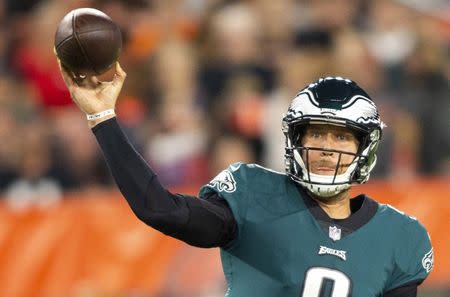 FILE PHOTO - Aug 23, 2018; Cleveland, OH, USA; Philadelphia Eagles quarterback Nick Foles (9) makes a pass against the Cleveland Browns during the first quarter at FirstEnergy Stadium. Mandatory Credit: Scott R. Galvin-USA TODAY Sports