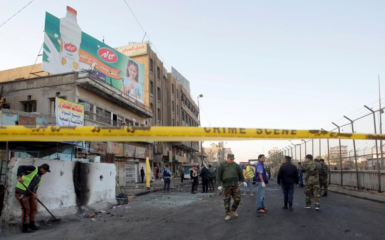 Twin explosions also wounded more than 100 others during rush hour in the city's Tayran Square - REUTERS