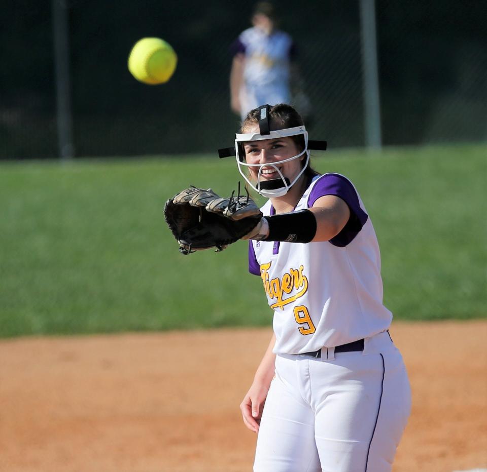 Hagerstown sophomore Hannah Pyle smiles as she catches the ball during a game against Northeastern May 12, 2022.