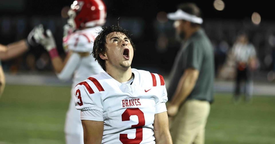 Indian Hill's Noah Frazier reacts after the Braves beat Wyoming 21-3 Friday, Oct. 13, 2023.