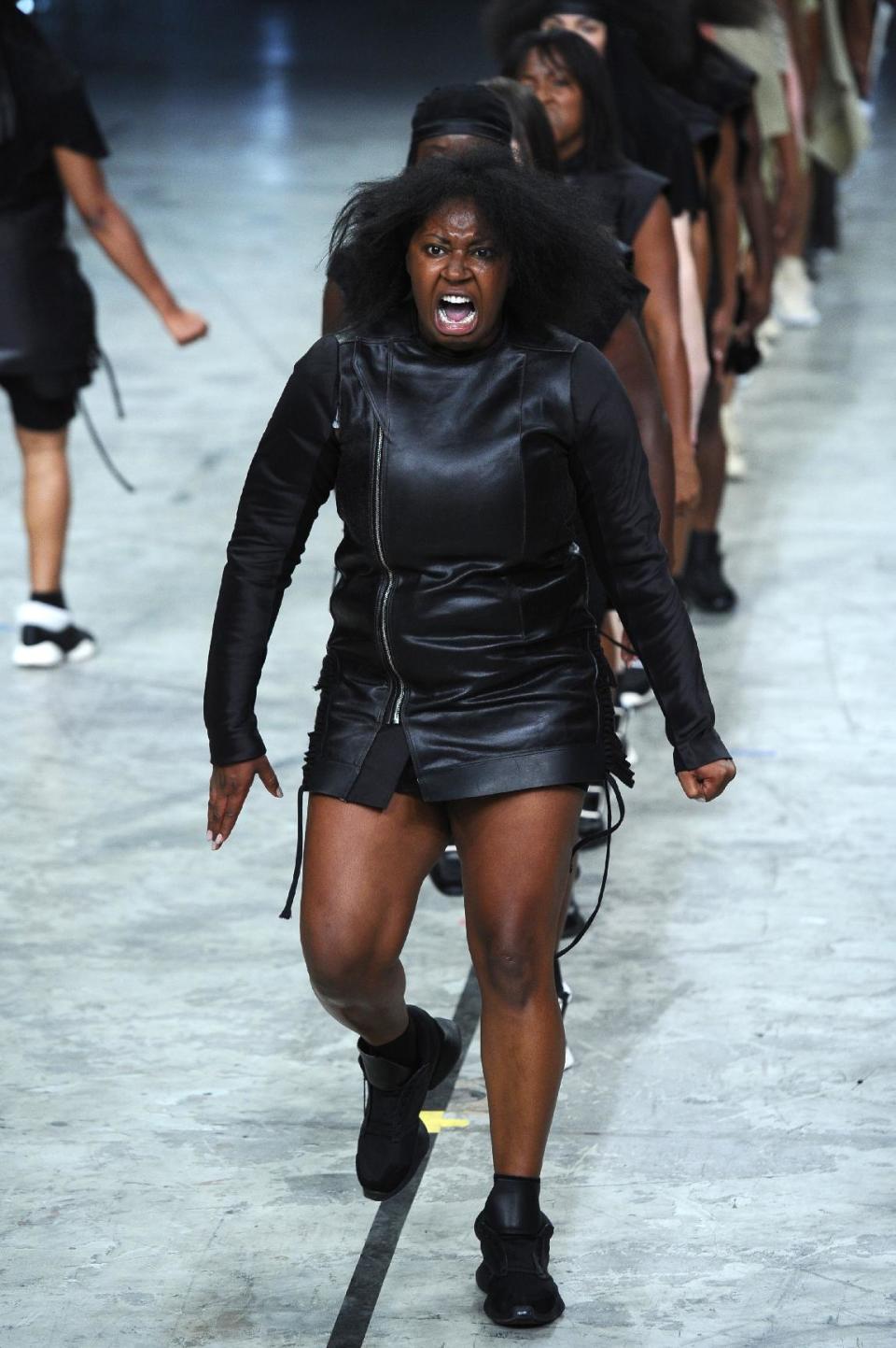 Models present creations as part of fashion designer Rick Owens ready-to-wear Spring/Summer 2014 fashion collection presented in Paris, Thursday, Sept. 26, 2013. (AP Photo/Zacharie Scheurer)