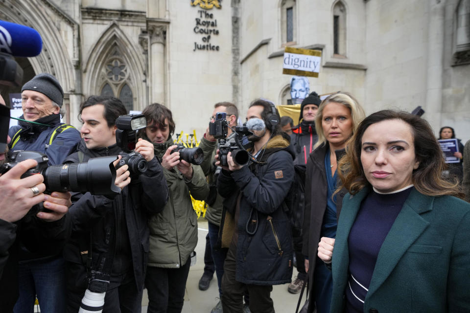Stella Assange wife, right, of Julian Assange arrives at the Royal Courts of Justice in London, Tuesday, Feb. 20, 2024. WikiLeaks founder Julian Assange will make his final appeal against his impending extradition to the United States at the court. (AP Photo/Kirsty Wigglesworth)