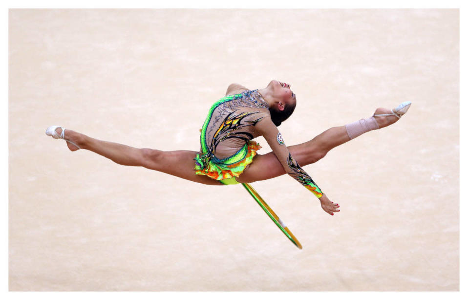 <p>For women’s gymnastics, it’s all about the leotard. While artistic gymnastics uniforms can be also be flashy, rhythmic gymnastics uniforms have revealing flesh-toned panels, sparkles, and ruffles galore. </p><p><i>(Photo: Getty Images)</i><br></p>