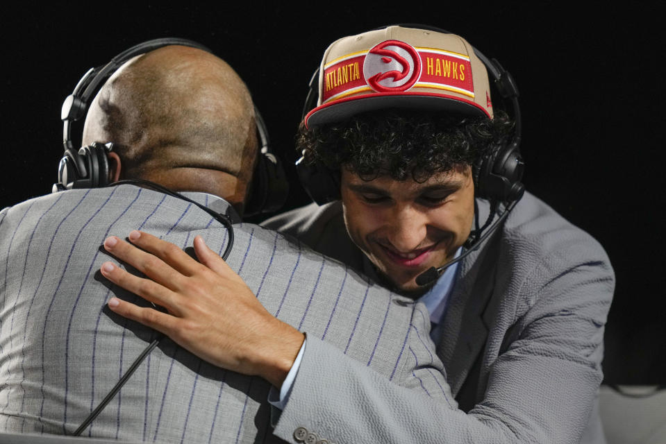 Zaccharie Risacher reacts during an interview after being selected by the Atlanta Hawks as the first pick during the first round in the NBA basketball draft, Wednesday, June 26, 2024, in New York. (AP Photo/Julia Nikhinson)