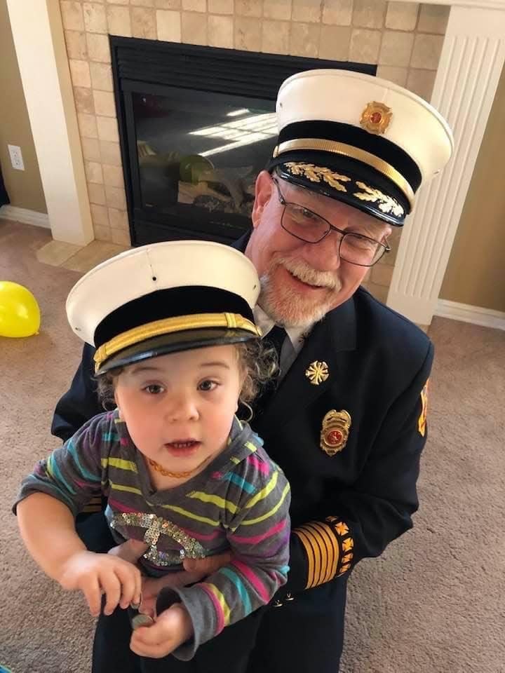 Tecumseh Fire Chief Joe Tuckey is pictured here with his granddaughter, Olivia.