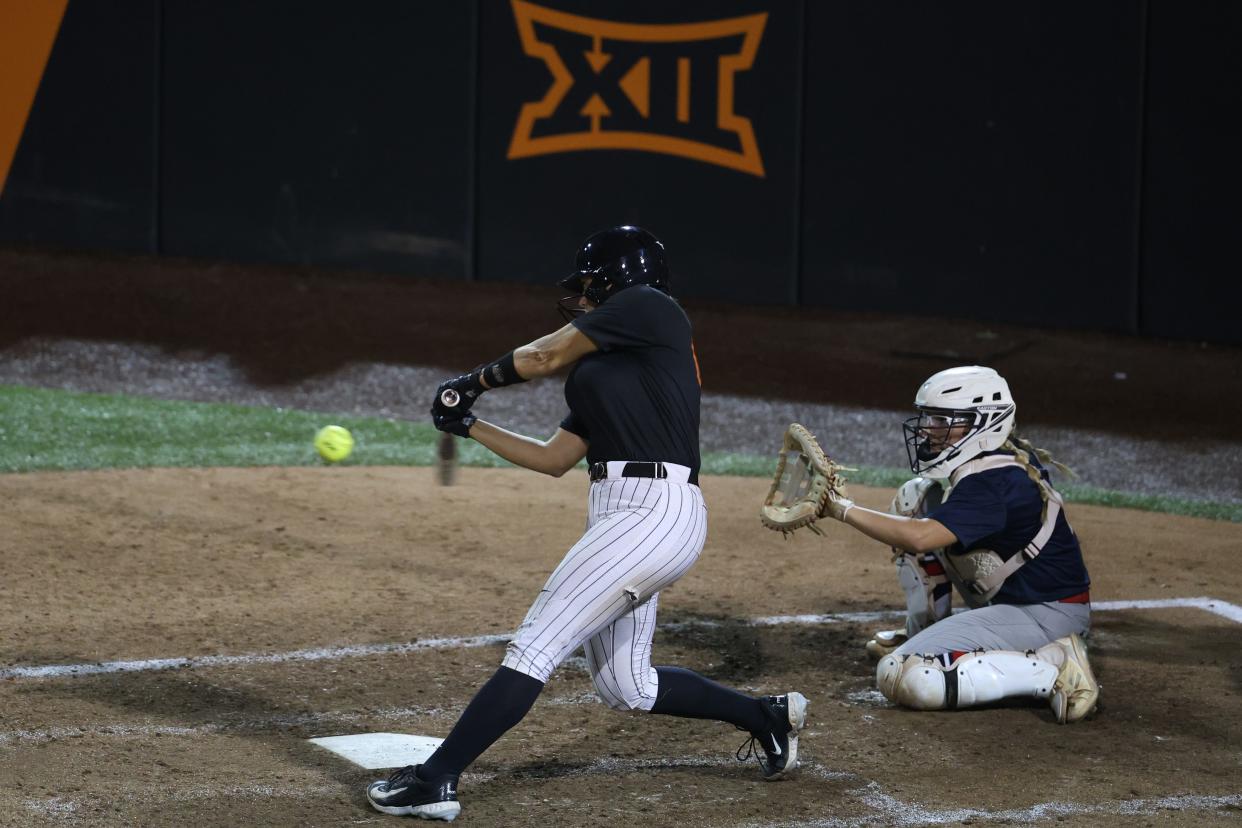 OSU's Caroline Wang hits the ball during a fall softball scrimmage against Seminole State College on Oct. 10 in Stillwater.