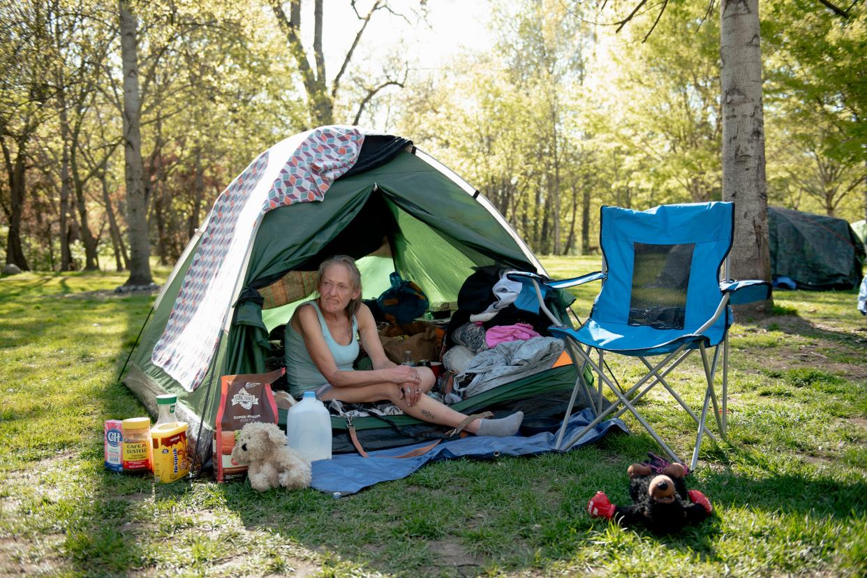 “We would love if the kids had their parks back. But where are we going to go?” said Brenda Daigneault who sits in her tent in Tussing Park on April 10 in Grants Pass, Ore. Daigneault is one of hundreds living unhoused in Grants Pass that could be affected by the Supreme Court as it hears arguments in late April on an ordinance that could criminalize camping in the city’s public parks.