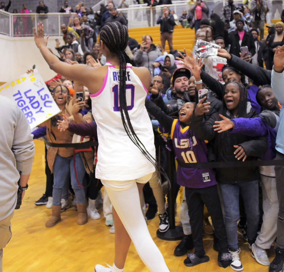 Fans react as LSU forward Angel Reese and her team leave after an NCAA college basketball game against the Coppin State, Wednesday, Dec. 20, 2023 in Baltimore. (Karl Merton Ferron/The Baltimore Sun via AP)