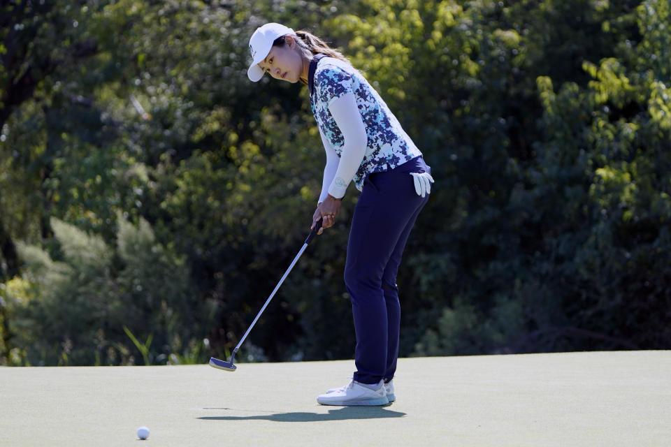 Xiyu Janet Lin, of China, putts on the eight green during the final round of the LPGA The Ascendant golf tournament in The Colony, Texas, Sunday, Oct. 2, 2022. (AP Photo/LM Otero)