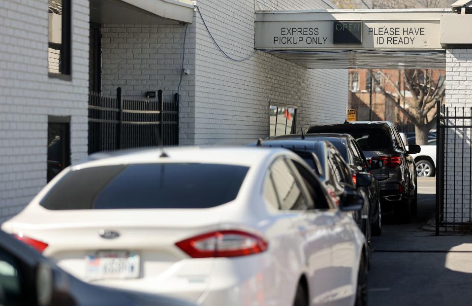 A line of vehicles wraps around Dragonfly Wellness and extends onto State Street as people wait to pick up their medical cannabis at Dragonfly Wellness in Salt Lake City on Thursday, April 20, 2023. | Kristin Murphy, Deseret News