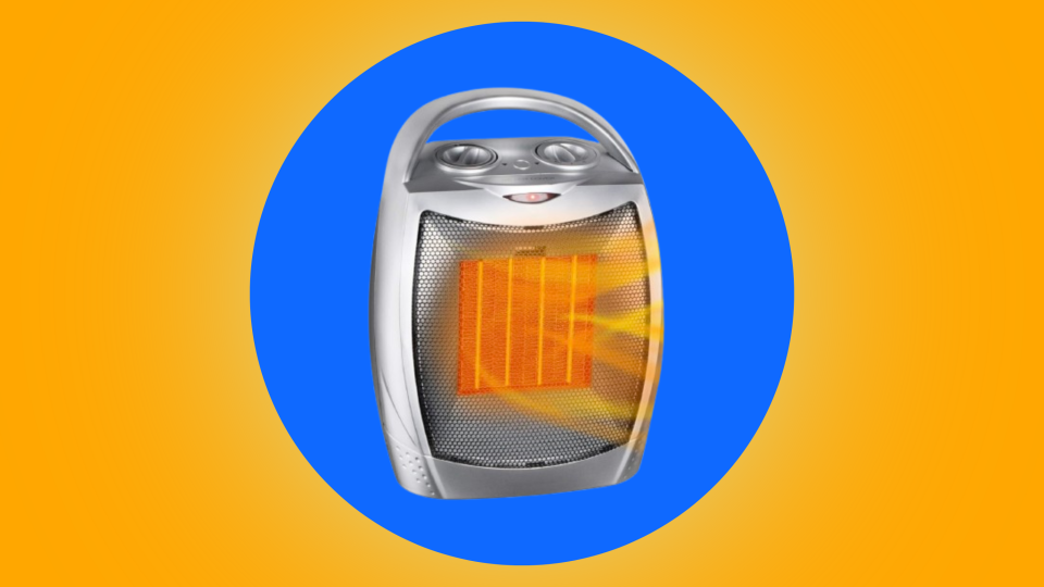 silver space heater over blue and orange background