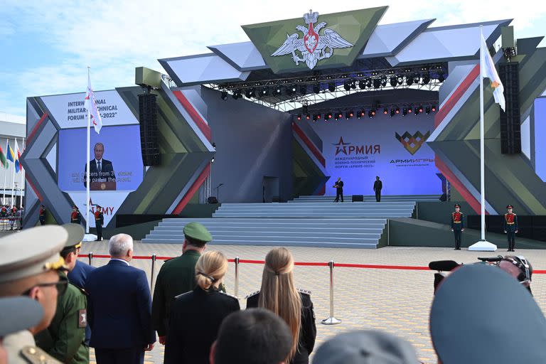 Russian President Vladimir Putin (?) delivers a speech during the opening ceremony of the Army-2022 International Military-Technical Forum and the International Army Games 2022 at the Russian Armed Forces' Patriot Park in Kubinka outside Moscow on August 15, 2022. (Photo by Mikhail Klimentyev / Sputnik / AFP)