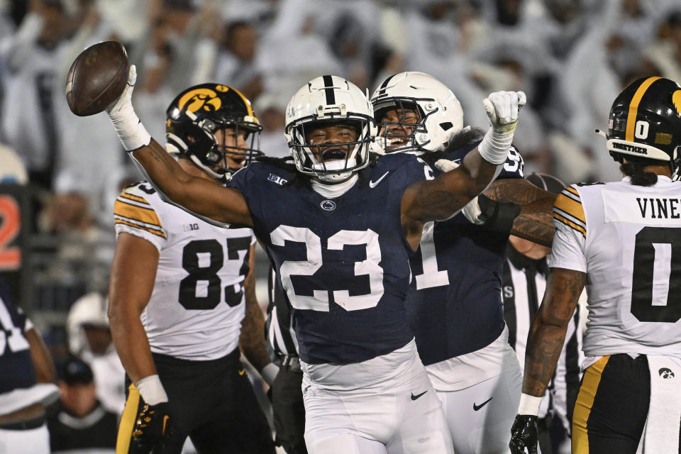 Penn State linebacker Curtis Jacobs (23) celebrates after recovering a fumble during the first half of an NCAA college football game against Iowa, Saturday, Sept. 23, 2023, in State College, Pa. (AP Photo/Barry Reeger)