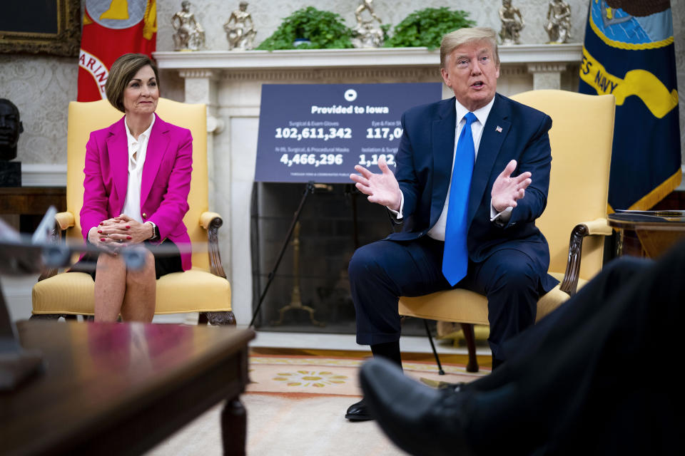 Gov. Kim Reynolds (R-Iowa) and President Donald Trump have both resisted calls for more aggressive public health efforts. Iowa, like South Dakota, is now one of the worst hot spots in the country. (Photo: Pool via Getty Images)