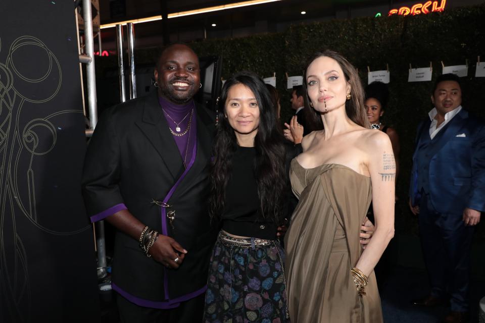 <div class="paragraphs"><p>Brian Tyree Henry with <em>Eternals </em>director Chloe Zhao and Angelina Jolie.</p></div>