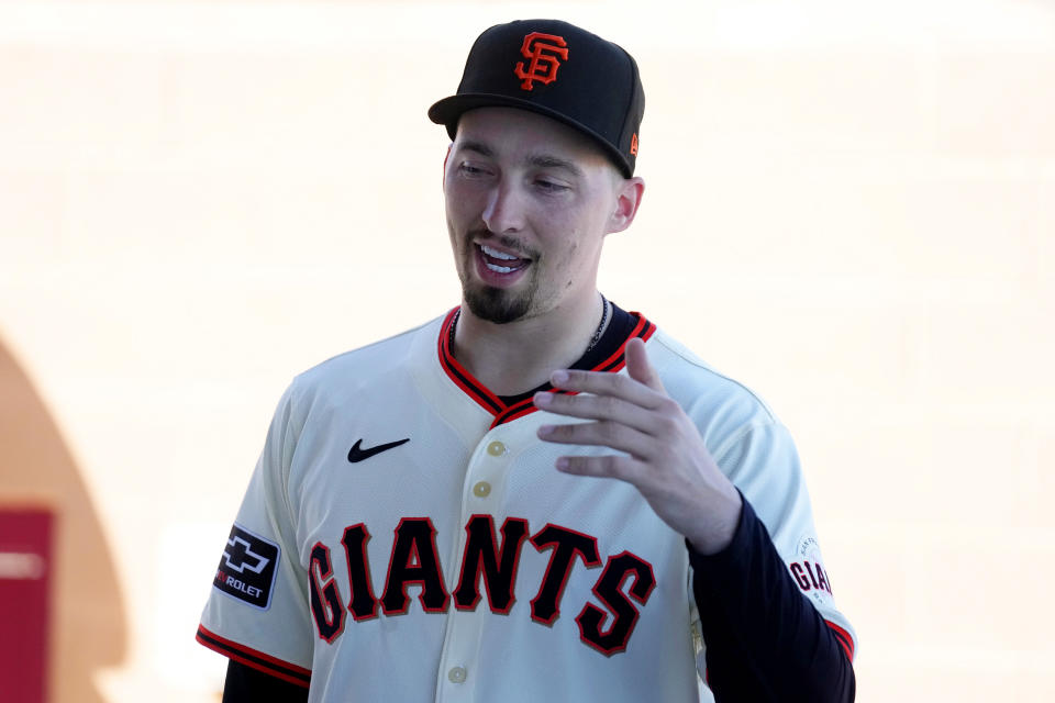 New San Francisco Giants pitcher Blake Snell speaks to reporters after he was introduced during a baseball news conference Wednesday, March 20, 2024, in Scottsdale, Ariz. (AP Photo/Ross D. Franklin)