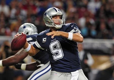 Sep 21, 2014; St. Louis, MO, USA; Dallas Cowboys quarterback Tony Romo (9) throws against the St. Louis Rams during the first half at the Edward Jones Dome. Mandatory Credit: Jeff Curry-USA TODAY Sports