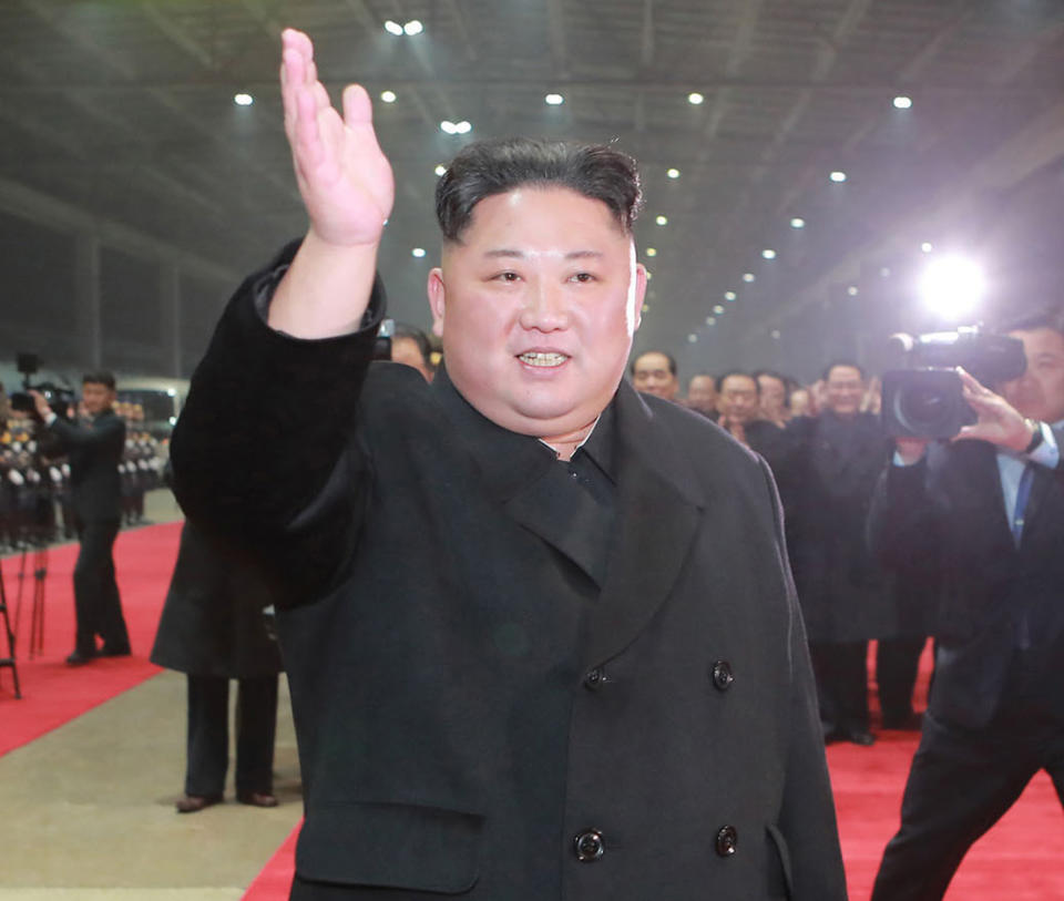 In this March 5, 2019, photo provided by the North Korean government, North Korean leader Kim Jong Un waves at Pyongyang station as Kim returned home on Tuesday after traveling a day and a half by train from Vietnam, where his high-stakes nuclear summit with President Donald Trump ended without any agreement, in Pyongyang. The content of this image is as provided and cannot be independently verified. Korean language watermark on image as provided by source reads: "KCNA" which is the abbreviation for Korean Central News Agency. (Korean Central News Agency/Korea News Service via AP)