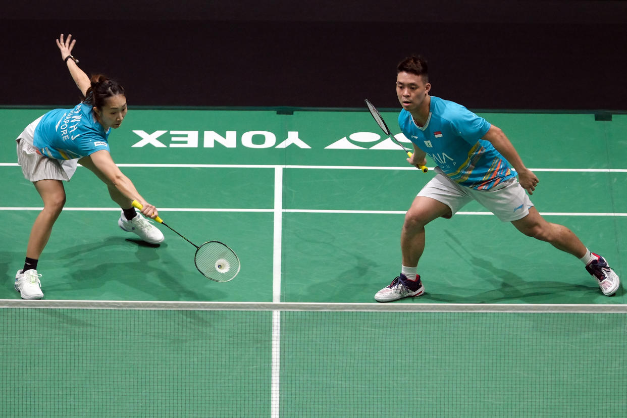 Singapore mixed doubles badminton duo Terry Hee (left) and Jessica Tan in action against Thailand's Dechapol Puavaranukroh and Sapsiree Taerattanachai at the 2024 Petronas Malaysia Open.