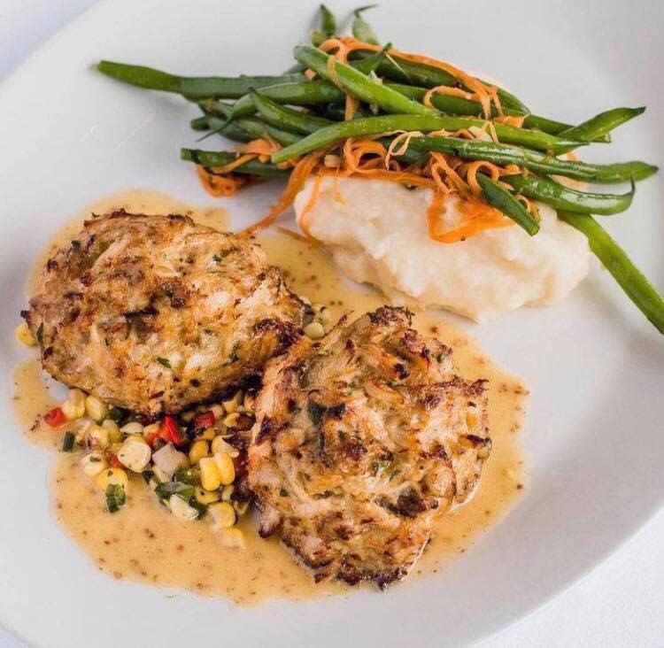 The Grand Marlin's lump blue crab meat crab cake dish is still available, but crab dishes in and around Pensacola are becoming harder to come across in the summer of 2021 due to a worldwide crab shortage brought on by COVID-19.