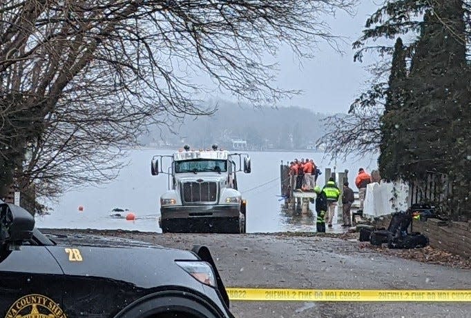 Divers with the Ottawa County Sheriff's Office located and removed a fully submerged vehicle from Lake Macatawa on Sunday, Jan. 22.
