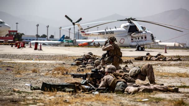 PHOTO: In this image provided by the U.S. Marine Corps, Marines assigned to the Special Purpose Marine Air Ground Task Force-Crisis Response-Central Command provide security at Hamid Karzai International Airport in Kabul, Afghanistan, on Aug. 18, 2021. (1st Lt. Mark Andries/U.S. Marine Corps via AP)