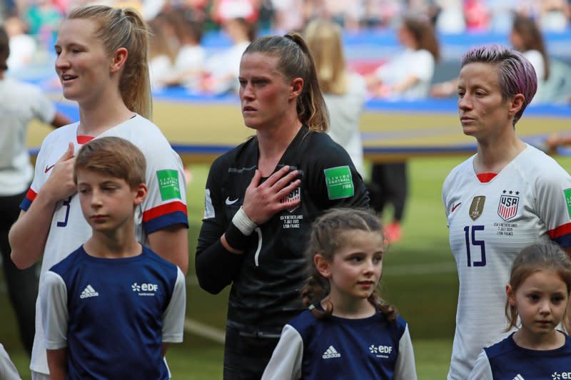 Longtime United States Women's National Team midfielder Sam Mewis (L) cited a knee injury as a reason for her retirement from soccer. File Photo by David Silpa/UPI