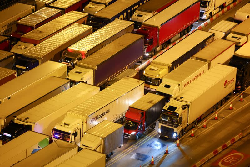 Vehicles queue on the motorway on the way into the port of Dover