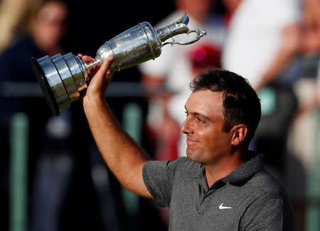 Golf - The 147th Open Championship - Carnoustie, Britain - July 22, 2018 Italy's Francesco Molinari celebrates with the Claret Jug after winning the 147th Open Championship REUTERS/Paul Childs