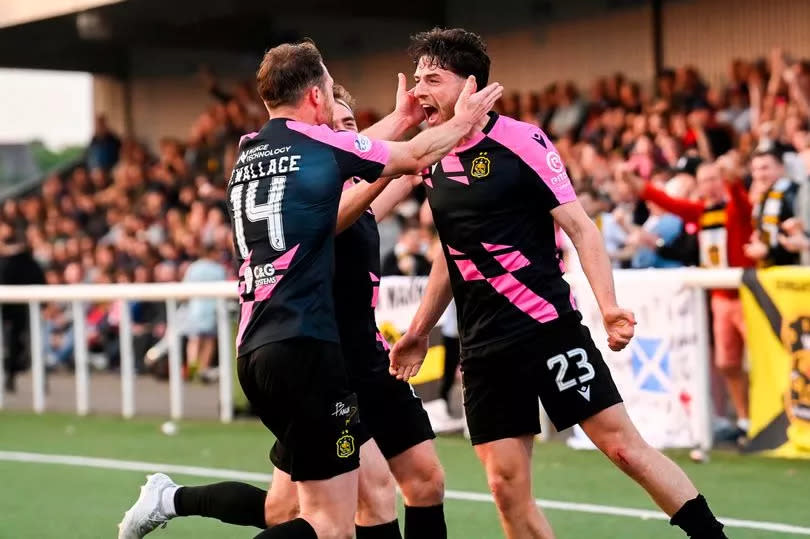 Michael Ruth celebrates scoring to make it 2-1 with his teammates during the cinch League One Play-Off Final