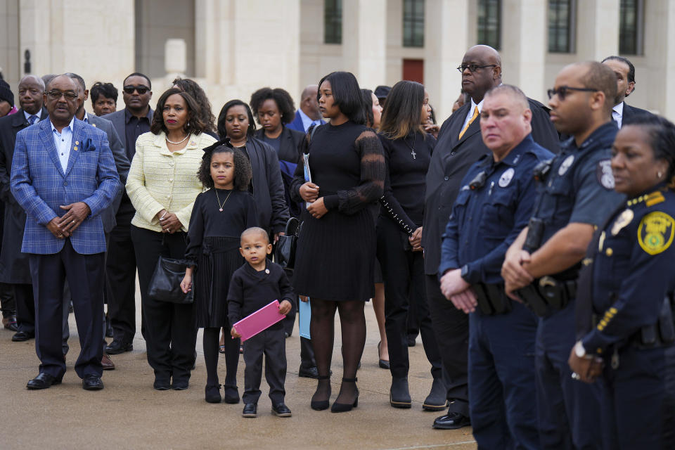 Family members, including son Kirk Johnson, left, and his wife Sondra Johnson, watch as the casket of former U.S. Rep. Eddie Bernice Johnson is placed in a hearse while departing the Hall of State in Fair Park after she lied in state on Monday, Jan. 8, 2024, in Dallas. Johnson, a trailblazing North Texas Democrat who served 15 terms in Congress, died at age 89 on Dec. 31. Her funeral will be held Tuesday at Concord Church in Dallas. (Smiley Pool/The Dallas Morning News via AP, Pool)