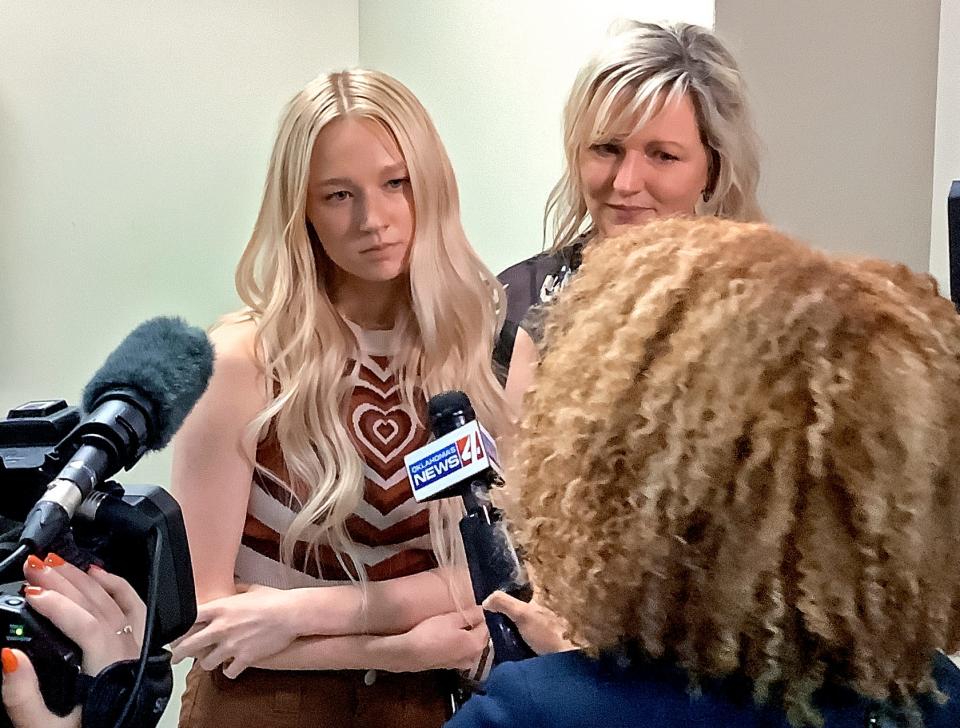 Allyson "Ally" Stephens and her mother, Kim Stephens, speak with reporters Friday shortly after the jury finds Ford guilty of domestic violence. Ally had been vocal about her experience with domestic abuse and said she hopes the lesson of her abusive relationship with Ford can help other women not have to go through a similar experience.