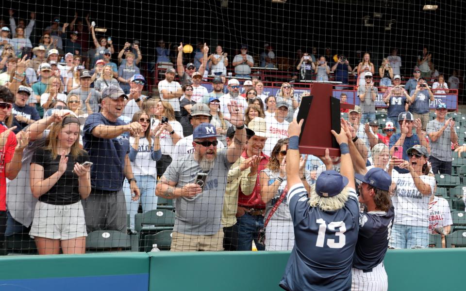 Marlow's Dawson Baker, left, and Mason Holding celebrate with fans following the Class 4A baseball state championship between Marlow and Blanchard at Chickasaw Bricktown Ballpark in Oklahoma City, Saturday, May, 11, 2024.