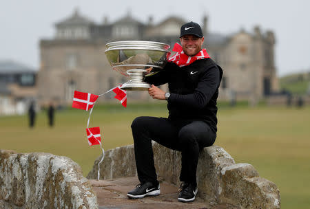 FILE PHOTO: Golf - European Tour - Alfred Dunhill Links Championship - St Andrews, Britain - October 7, 2018. Lucas Bjerregaard celebrates with the trophy after winning the Alfred Dunhill Links Championship Action Images via Reuters/Lee Smith/File Photo