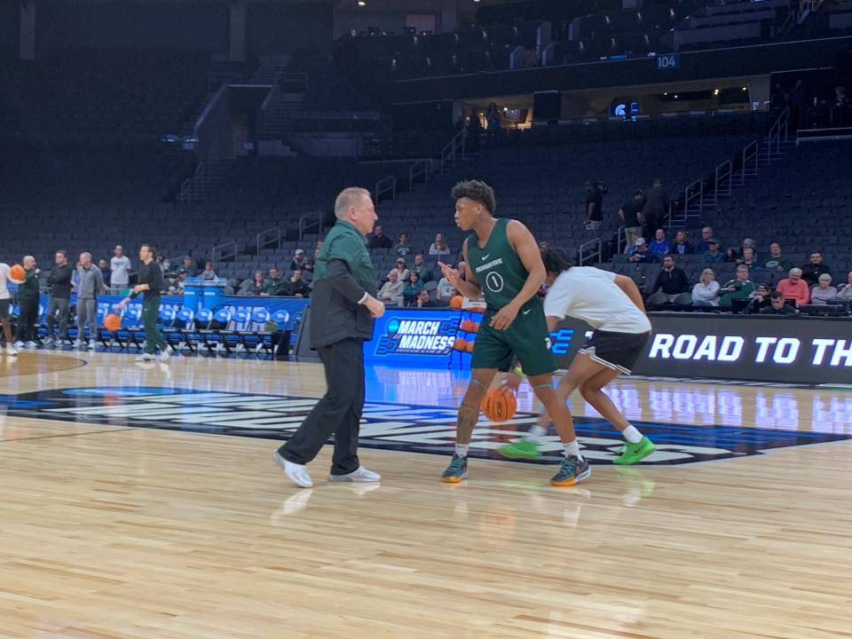 Jeremy Fears and Tom Izzo talk during Michigan State basketball's open practice Wednesday, March 20, 2024, at Spectrum Center in Charlotte, N.C. The Spartans face Mississippi State in the NCAA tournament, but Fears remains out after being shot in December 2023.