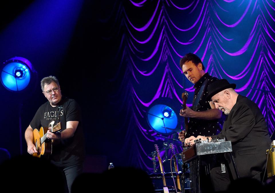 Singer/Songwriter Vince Gill, Guitarist Jedd Hughes, and Steel player Paul Franklin perform at The Fox Theatre on August 28, 2022, in Atlanta, Georgia.