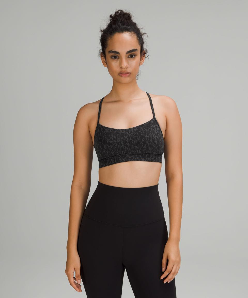 <h2>Flow Y Bra</h2><br><strong>Designed For: Yoga</strong><br>If the question is a low-impact yoga routine, then the obvious answer is this super-comfortable, ultra-soft sports bra. <br><br><em>Shop</em> <strong><em><a href="https://shop.lululemon.com/c/skirts-and-dresses-dresses/_/N-8s3" rel="nofollow noopener" target="_blank" data-ylk="slk:Lululemon Sports Bras" class="link ">Lululemon Sports Bras</a></em></strong><br><br><strong>Lululemon</strong> Flow Y Nulu Bra Light Support, A–C Cups, $, available at <a href="https://go.skimresources.com/?id=30283X879131&url=https%3A%2F%2Fshop.lululemon.com%2Fp%2Fwomen-sports-bras%2FFlow-Y-Bra-Nulu-MD%2F_%2Fprod10440021%3Fcolor%3D51039" rel="nofollow noopener" target="_blank" data-ylk="slk:Lululemon" class="link ">Lululemon</a>