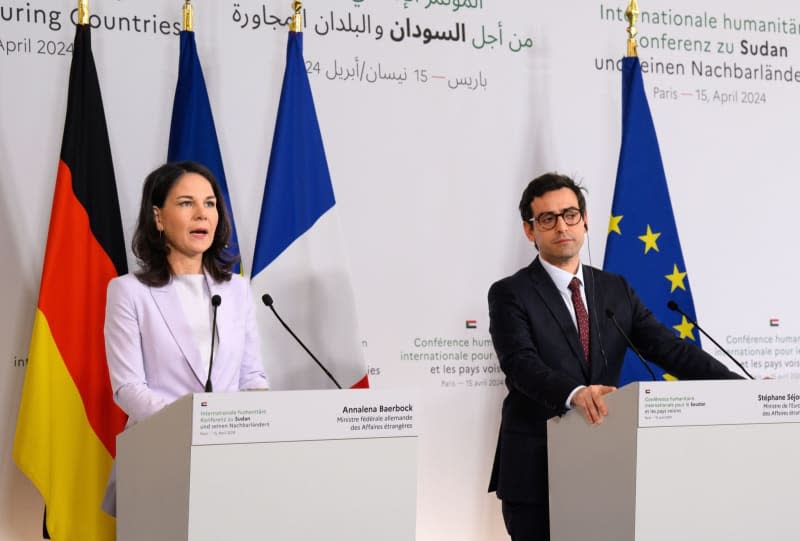 Annalena Baerbock (L), Foreign Minister, and Stephane Sejourne, France's Foreign Minister, speak at a press conference ahead of the ministerial meeting to support peace initiatives for Sudan. Bernd von Jutrczenka/dpa