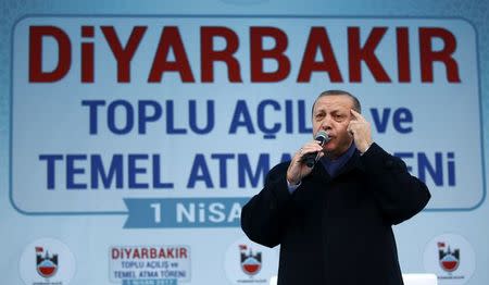 Turkish President Tayyip Erdogan addresses his supporters during a rally for the upcoming referendum in the Kurdish-dominated southeastern city of Diyarbakir, Turkey, April 1, 2017. REUTERS/Murad Sezer