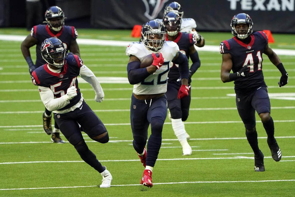 Tennessee Titans running back Derrick Henry (22) runs for a touchdown as Houston Texans' Jacob Martin (54) and Zach Cunningham (41) chase him. (AP Photo/Eric Christian Smith)