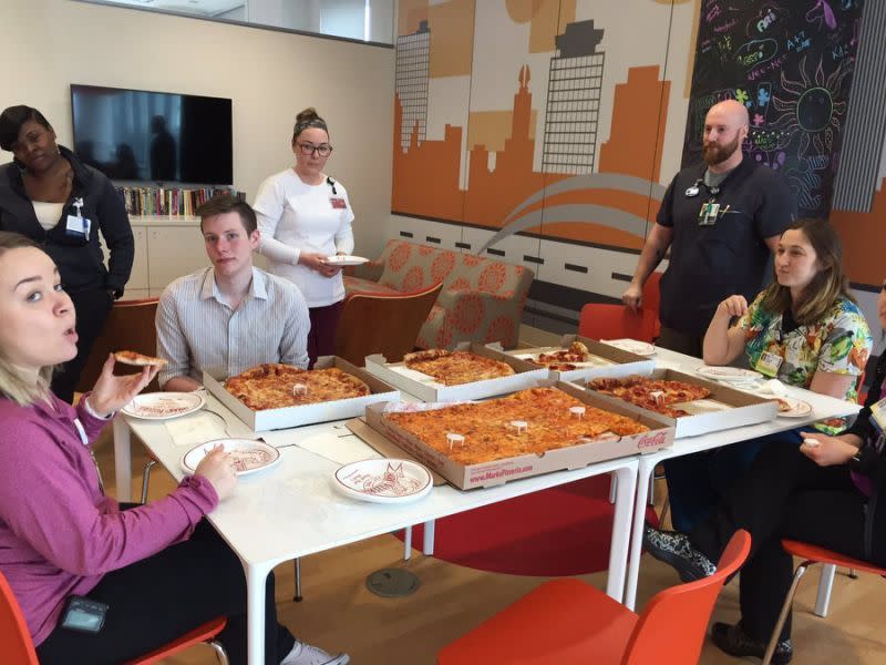 Cole Favro hosts a pizza party at the hospital with all the pizzas delivered to him over the Easter weekend. (Credit: Spectrum News Rochester Photographer Mike Moss)